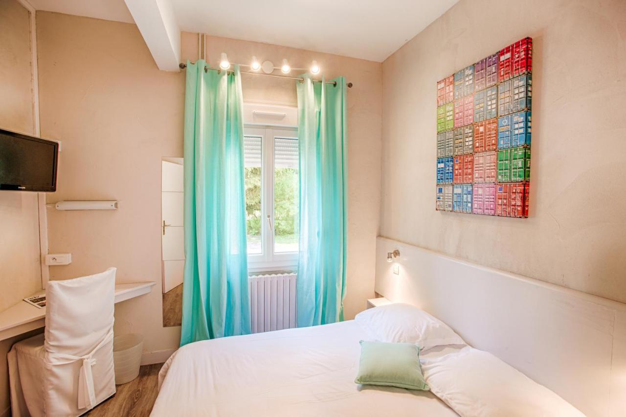 Logis Hotel Restaurant L'Ile De Sees Mace Ruang foto
